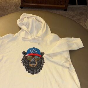 Wild Tribute Cream Hoodie with Bear Graphic